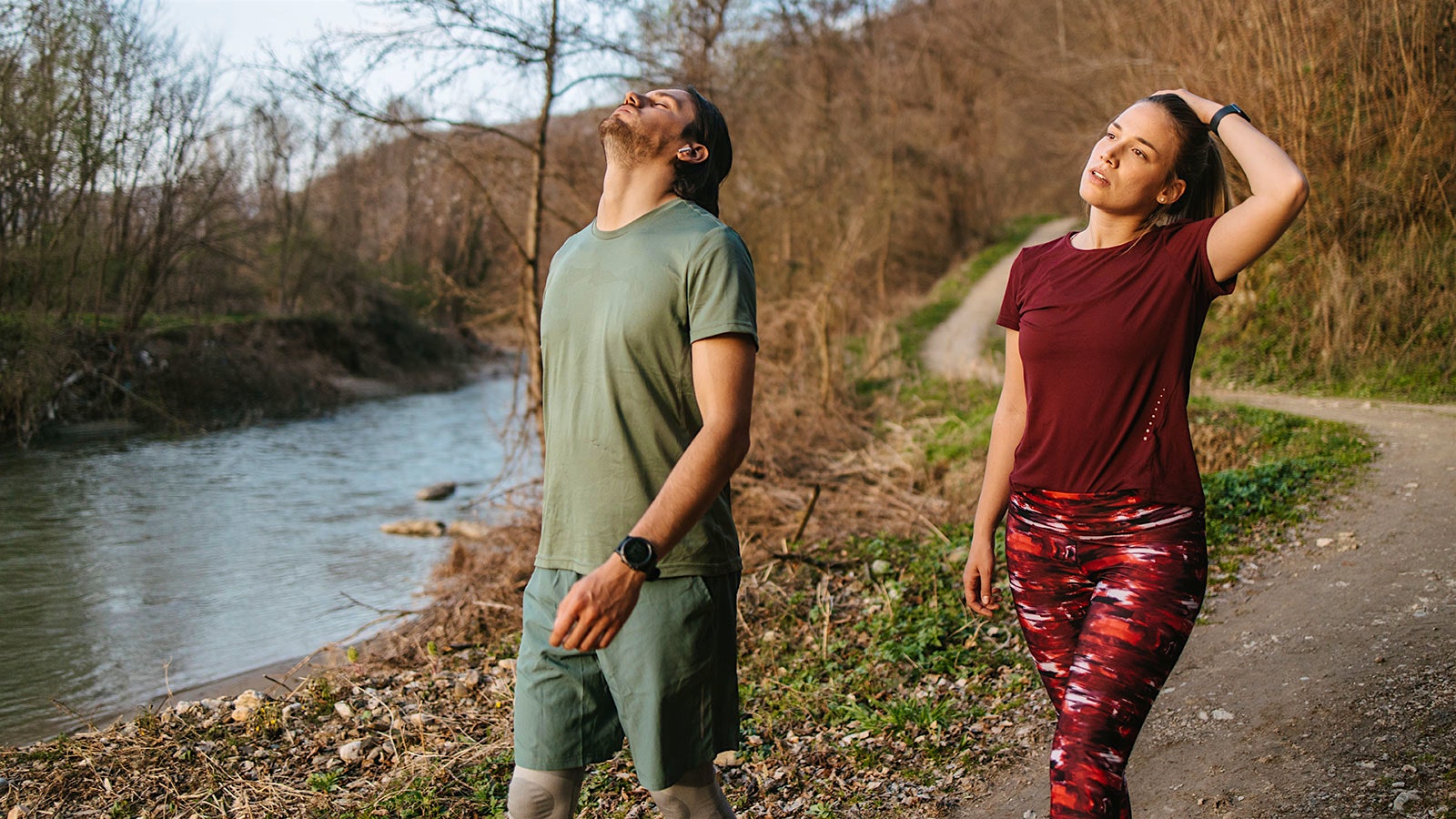 Man and woman walking outside